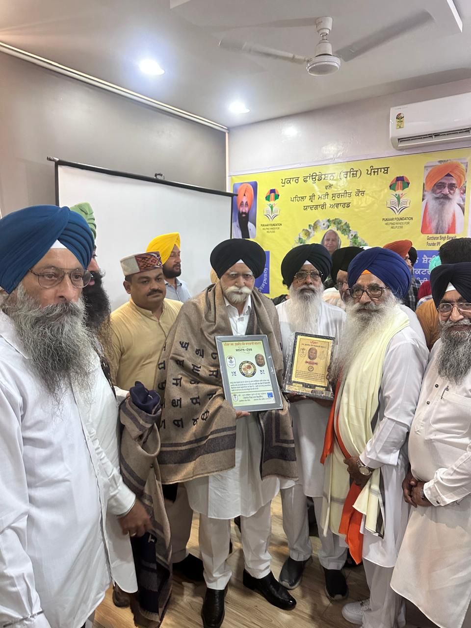 The Guru Nanak Mission Service Society received an international award for its outstanding services